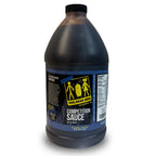 A large plastic jug of Yes, Dear BBQ Competition Sauce with a black cap and a blue and yellow label, shown on a white background.