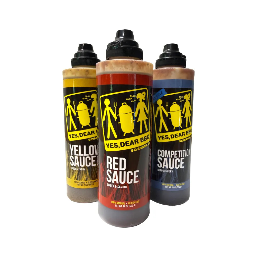 Three squeeze bottles of barbecue sauce on a plain white background: Yellow Sauce, Red Sauce, and Competition Sauce.