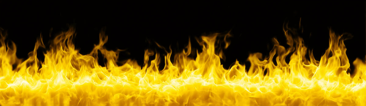 Bright yellow and orange flames dancing across a solid black background.