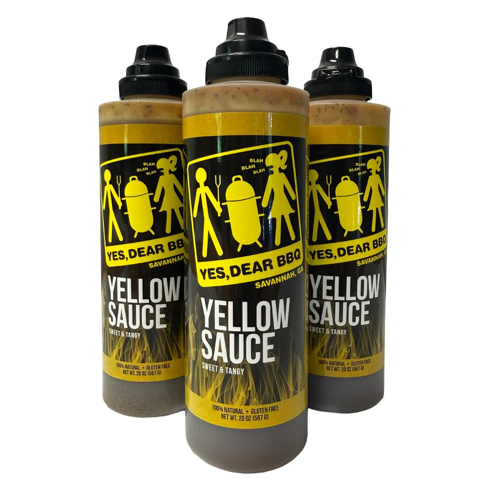Three squeeze bottles of YES, DEAR BBQ Yellow Sauce on a white background.