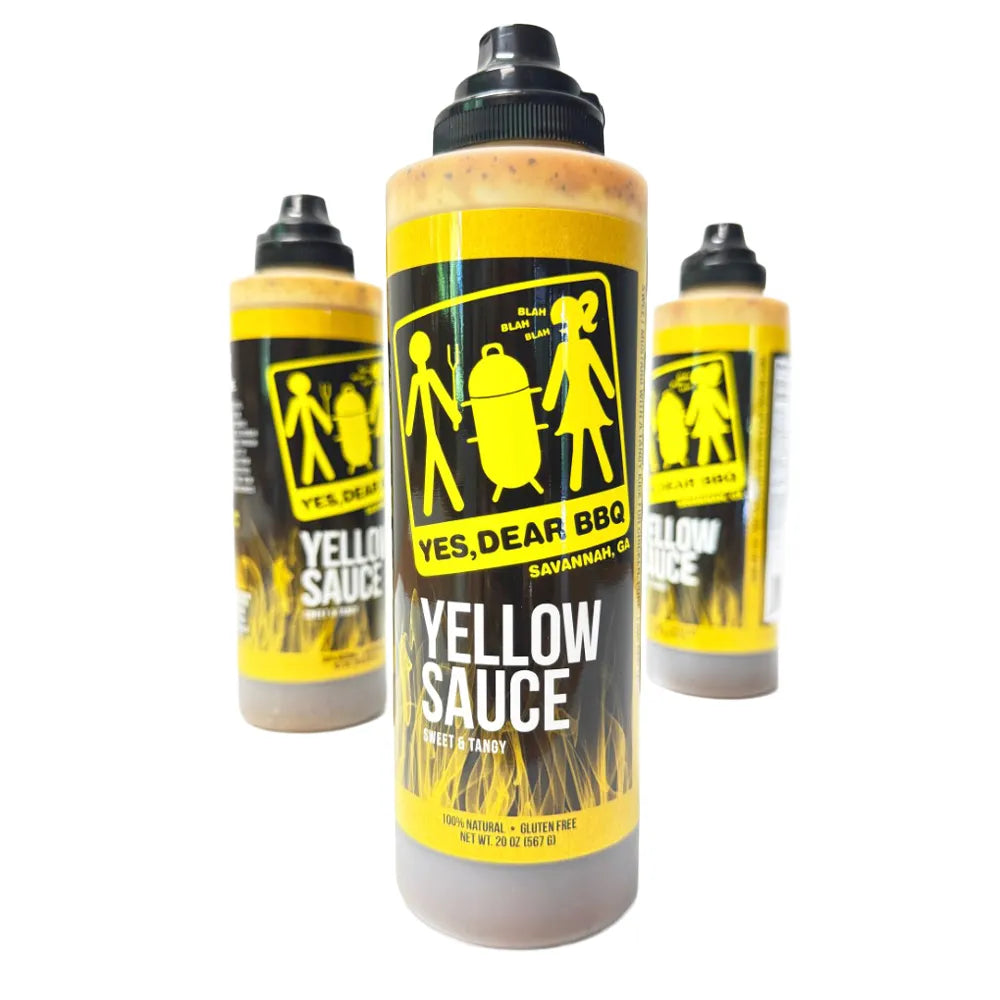 Three squeeze bottles of Yes, Dear BBQ Yellow Sauce on a plain white background.