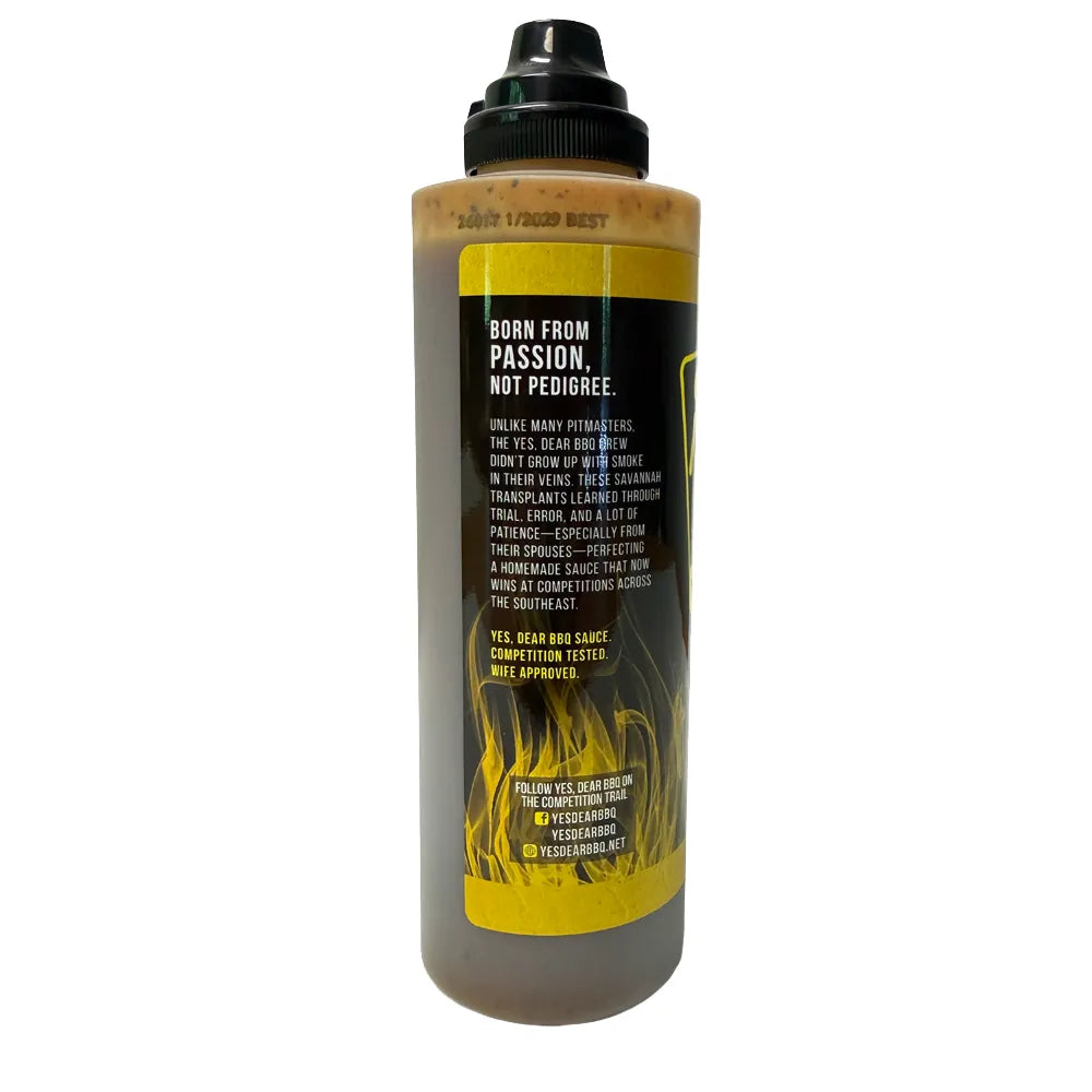 yellow sauce side shot of sauce bottle
